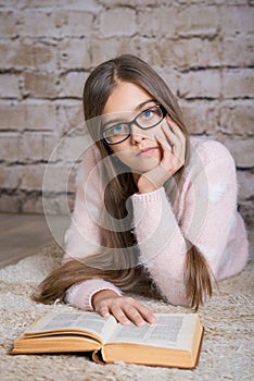 Beautiful girl reading book.