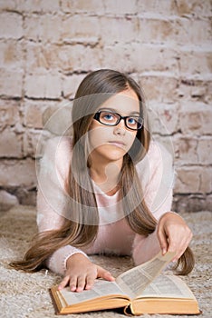 Beautiful girl reading book.