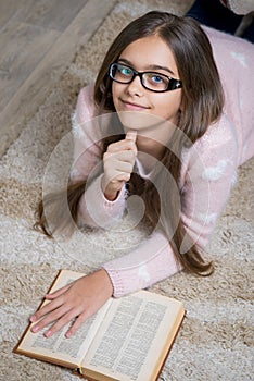 Beautiful girl reading book.