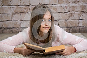 Beautiful girl reading book.