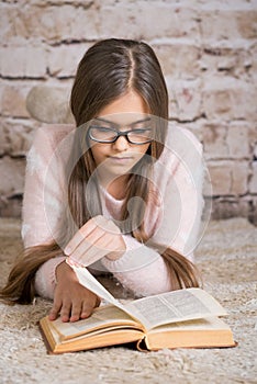 Beautiful girl reading book.