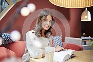 Beautiful girl reading book