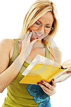 Beautiful Girl Reading a Book and Smiling