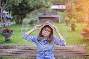 Beautiful girl reading books in the garden