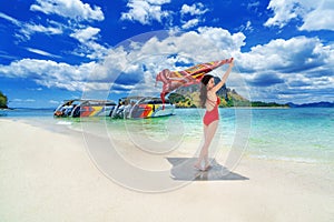 Beautiful girl in red bikini on beach, Poda island in Thailand. photo