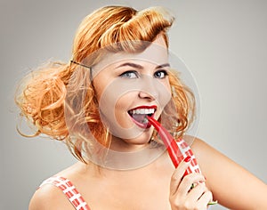 Beautiful Girl With Red Chilli Pepper In Pinup Style