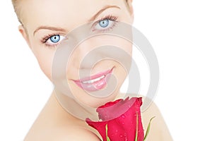 Beautiful girl with red rose