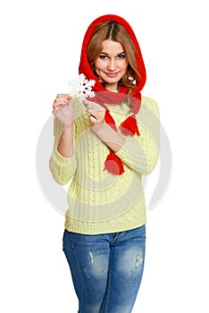 Beautiful girl in red scarf and snowflake isolated on white background, winter holiday concept
