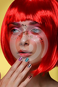 Beautiful girl in red wig