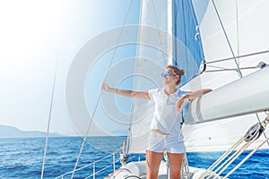 Beautiful Girl relaxing On Yacht in Greece