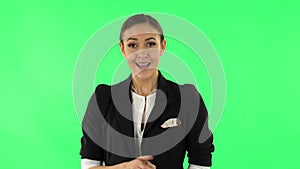 Beautiful girl is reporting and tells a lot of interesting informations. Green screen