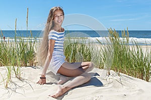 Beautiful  girl resting on the beach