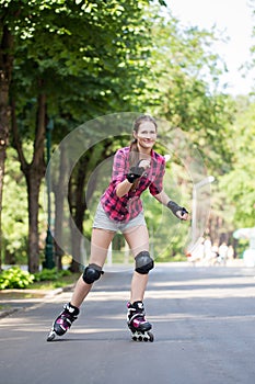 Beautiful girl on rollerblades