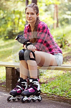 Beautiful girl on rollerblades