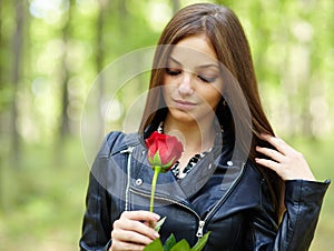 Beautiful girl with a rose