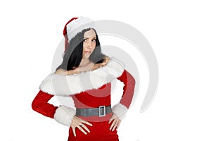 Beautiful girl Santa Claus with dark hair in suit on white background. Insulations.