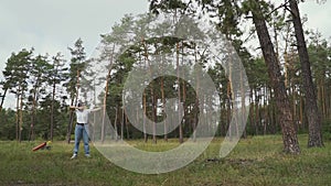 Beautiful girl shooting target with her bow and arrow