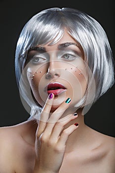 Beautiful girl in silver wig