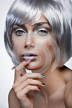 Beautiful girl in silver wig