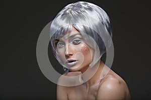 Beautiful girl in silver wig