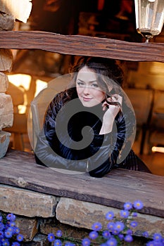 Beautiful girl, sitting on a window-sill