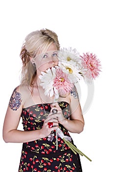 Beautiful Girl Smelling Flowers