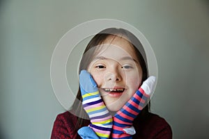 Beautiful girl smiling with different socks