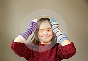 Beautiful girl smiling with different socks