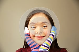 Beautiful girl smiling with different socks