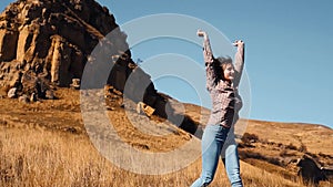 Beautiful girl spinning in the field