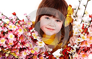 Beautiful girl with spring flower and butterfly.