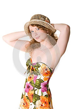 Beautiful girl in a straw hat