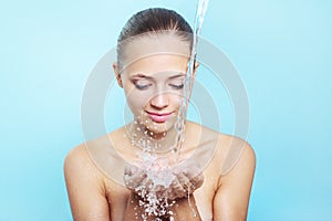 Beautiful girl and stream of water