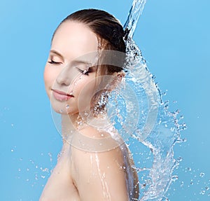 Beautiful girl and stream of water