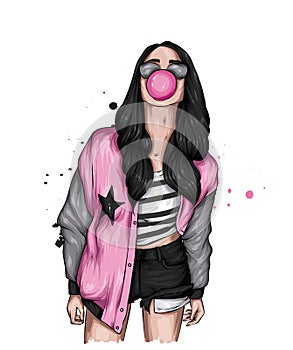 A beautiful girl in stylish clothes and with chewing gum. Fashion, style, clothing and accessories.