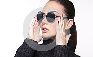 Beautiful girl with summer sunglasses and eye wear close up commercial concept