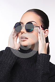 Beautiful girl with summer sunglasses and eye wear close up commercial concept