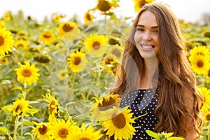 Beautiful girl with sunflowers