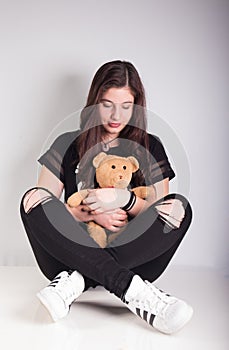 Beautiful girl with teddybear