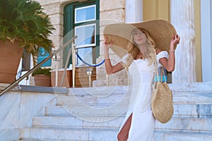 Beautiful girl tourist walking at Spetses island, Greece