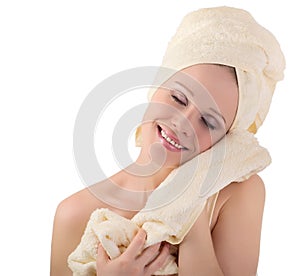 Beautiful girl in towel feels pleasure