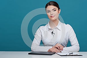 Beautiful girl tv newscaster is reporting sitting