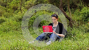 beautiful girl using computer in countryside 2