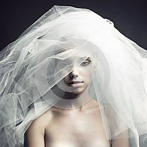 Beautiful girl in a veil