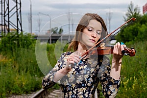 Beautiful girl with a violin