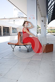 Beautiful girl wainting at railway station photo