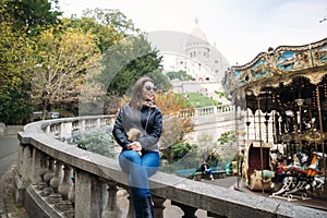 Beautiful girl is walkin in paris near the basilica