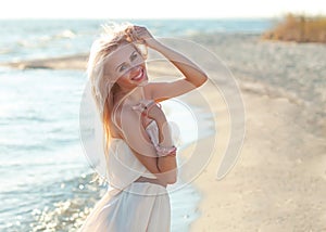 Beautiful girl walking down the beach