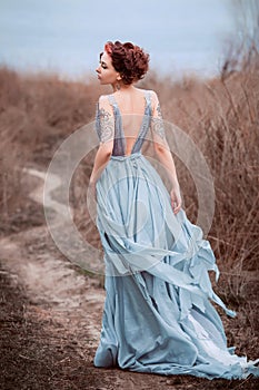 Beautiful girl walking in nature