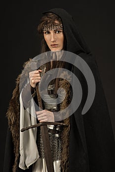 Beautiful Girl warrior in medieval clothes